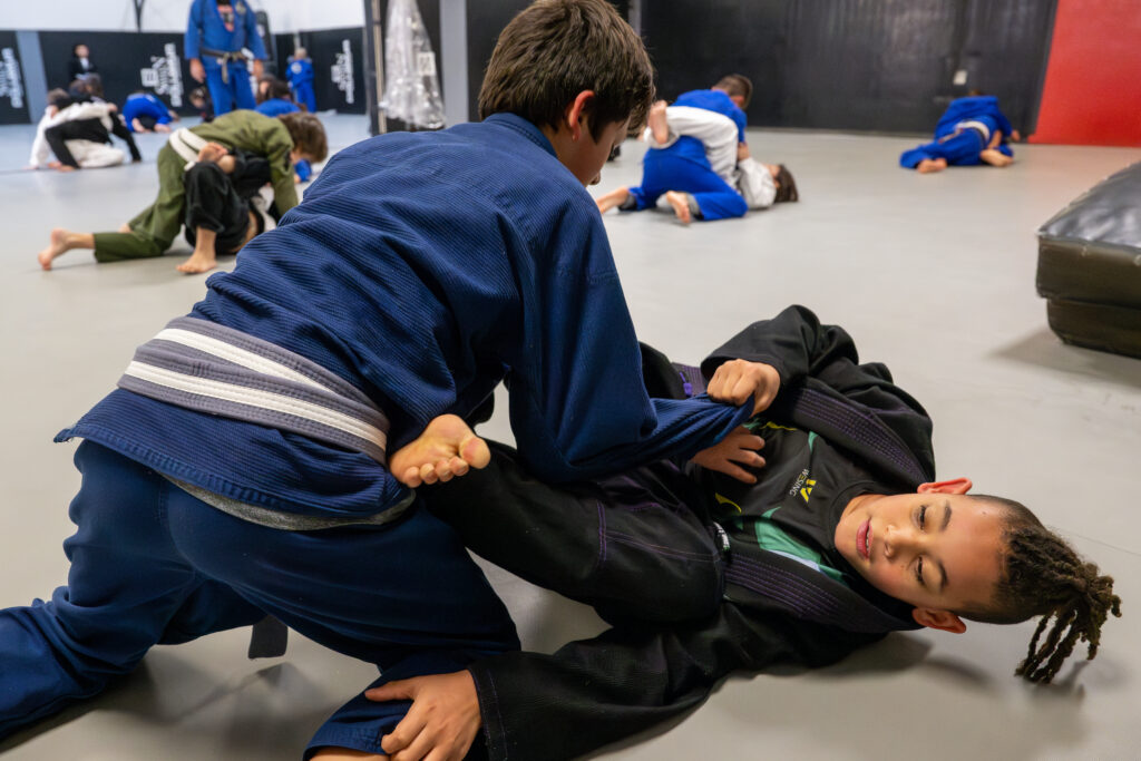 Young students practicing Jiu-Jitsu together